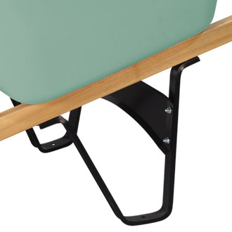 Close-up of the bottom part of a wheelbarrow. The image shows a green wheelbarrow tub attached to wooden handles and supported by a black metal frame.