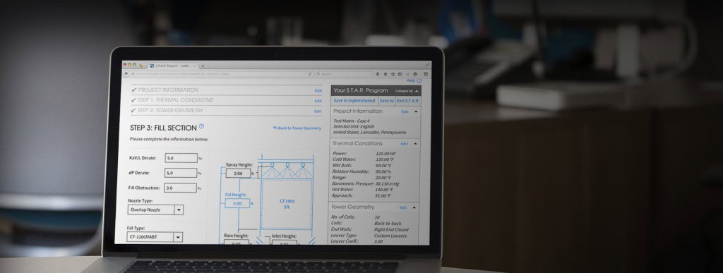 A laptop sits on a table with a technical drawing and cooling tower data on its screen. The displayed interface shows a "STEP 3: FILL SECTION" heading, various data input fields, and measurements.